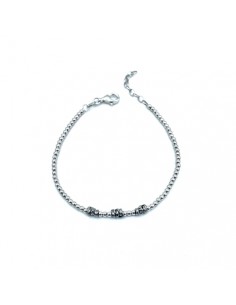 Pulsera de plata con bolitas y detalles centrales