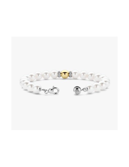 Pulsera Esencia de Luz con perlas y detalle bicolo